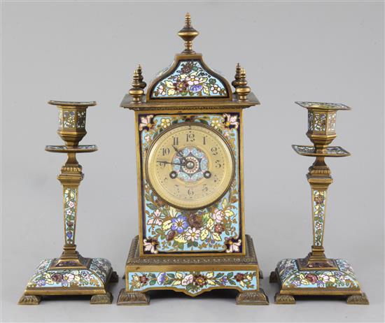 An early 20th century bronze and champleve enamel clock garniture, 8in.